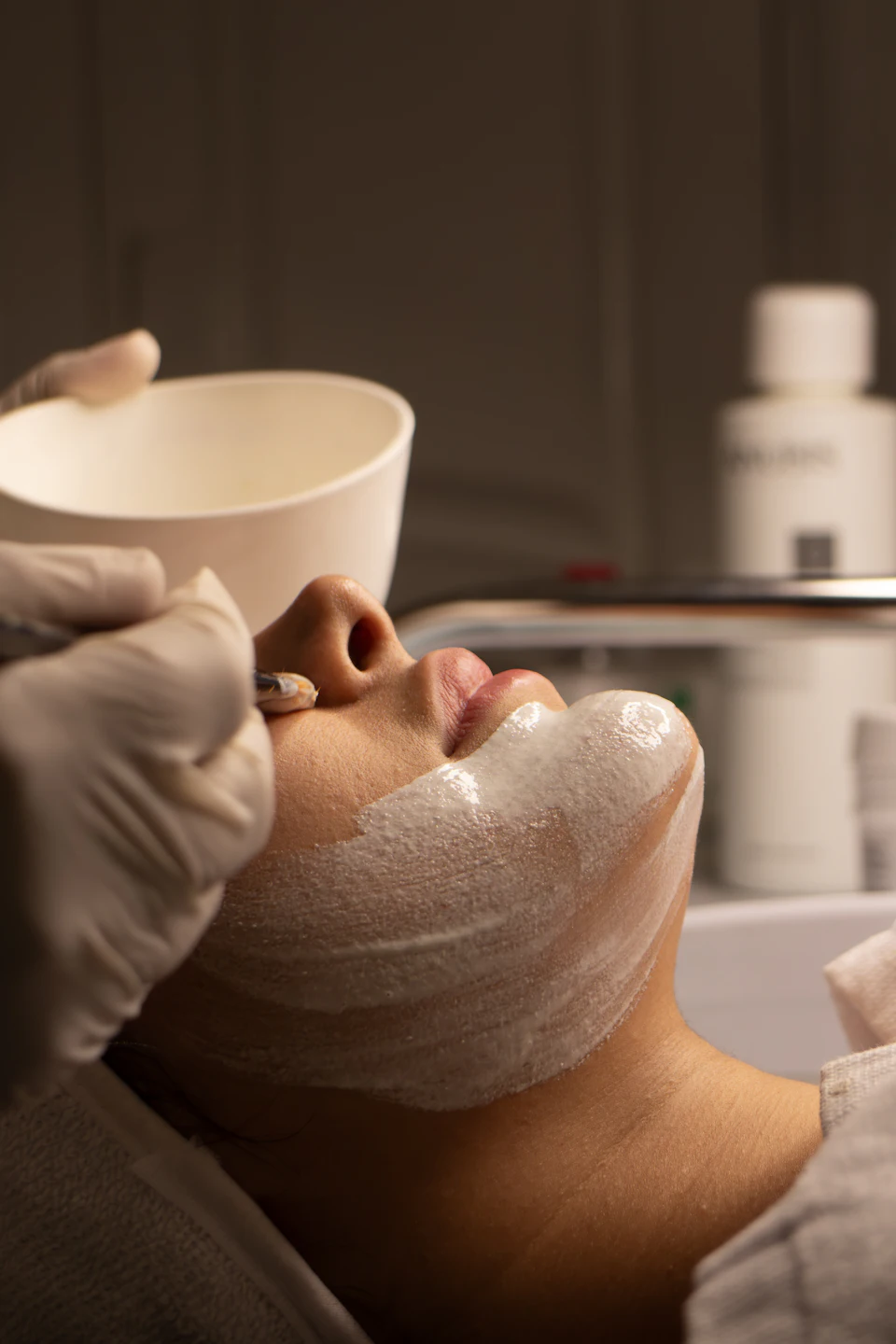 A person receiving a facial treatment