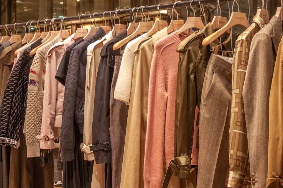 Assortment of clothing hanging on a rack